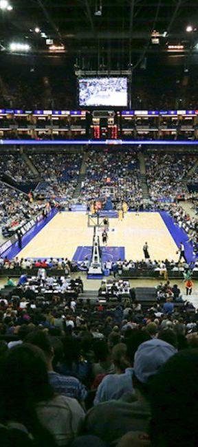 A packed UK basketball arena seen from the stands